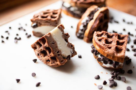 Chocolate espresso waffle ice cream sandwiches with mini chocolate chips made from Heavenly Foods mix